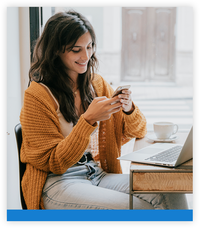 woman-browsing-smartphone-cafe